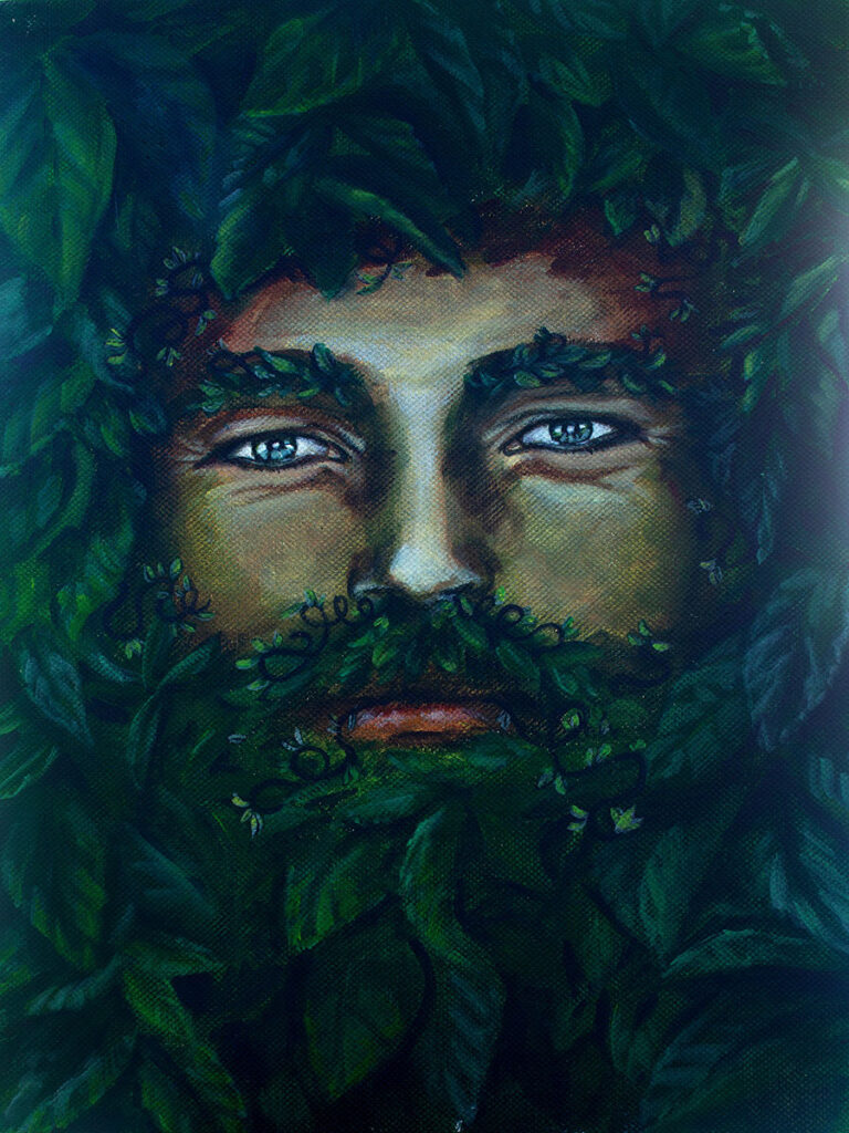 Le Greenman, caché dans son feuillage laissant son regard bleu surprendre le passant qui baisse les yeux. Sa chevelure n'est que feuillage vert.